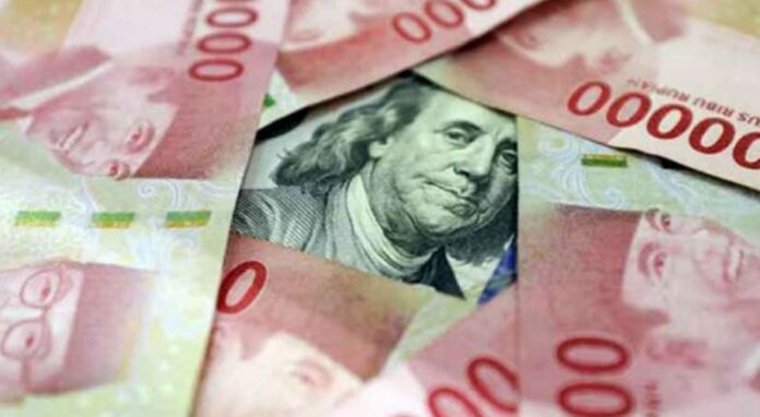 Rupiah Anjlok Sentuh Rp 14.609 Imbas Kebijakan Suku Bunga Acuan AS